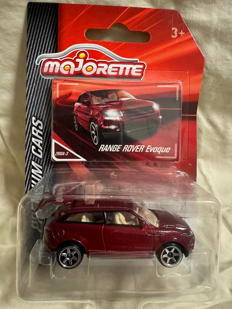 Premium Car - Range Rover Evoque Maroon
