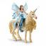 Eyela Riding On Golden Unicorn